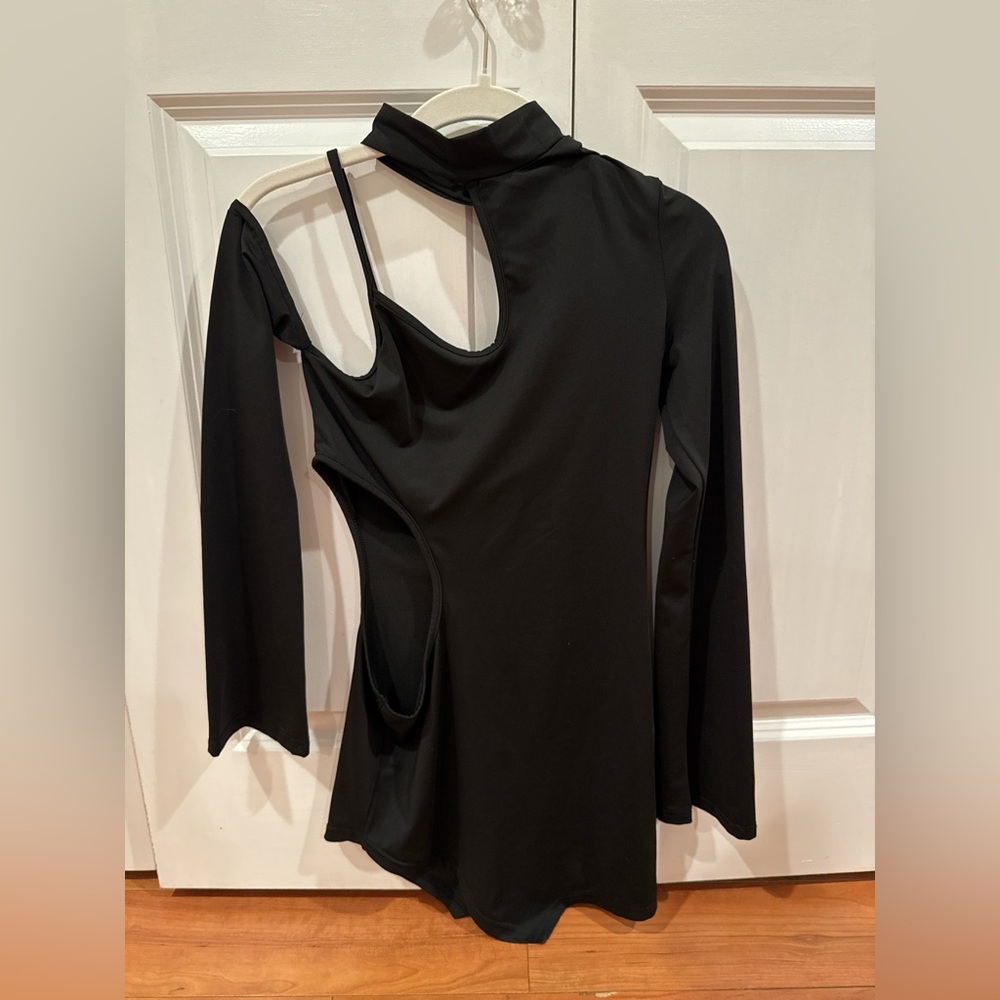 Black dress with high neck and cut out side detail
